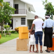 African American family moving into a new home after getting approved for a mortgage loan with Bank of St. Croix.